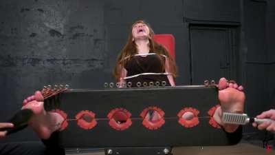 Anastasia's big feet tickled 