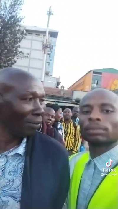 Zambian dude walks up to complete strangers waiting in line and just