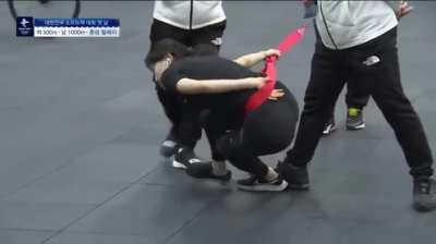 A speedskater warming-up before practice