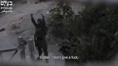 Israeli settlers from the illegal colony, Kiryat Arba, shout bigoted, homophobic, transphobic abuse & sexual threats at Palestinians from behind a fence, as IDF raid the Al-Harika neighborhood. Later on, Israeli soldiers make similar hateful remarks a