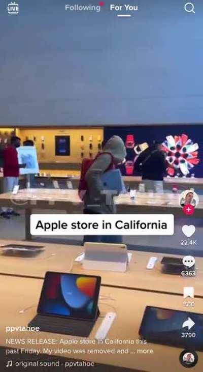 Apple store employees in California move customers out of the way to make it easier for a shoplifter to steal