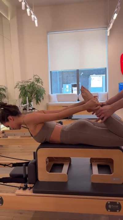 Back Stretches in Beige Leggings (IG HD Clip)