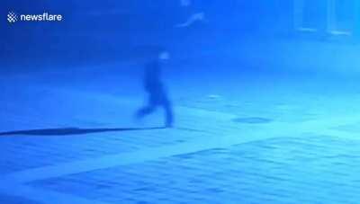 kid blows up manhole cover, manhole cover gets revenge.