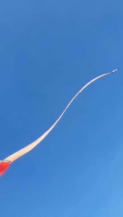 A 3 year old child got swept up with a kite.