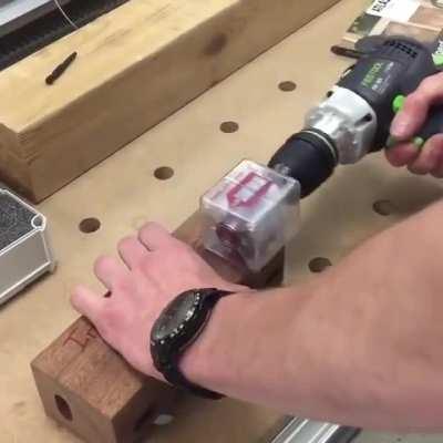Tightening hidden fasteners in wood with a spinning magnet (Lamello Invis Mx2)