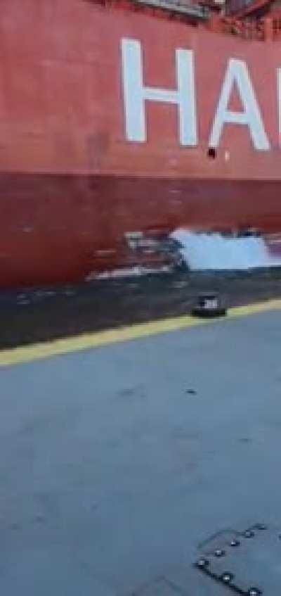 Filming an uncontrolled cargo ship.