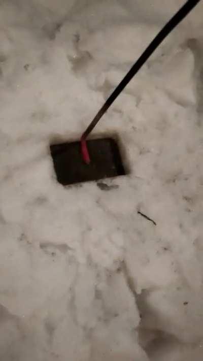 Red hot fire poker/ash scraper vs snow