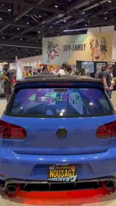 I put a projector in my car to play Holomens music videos at Cons