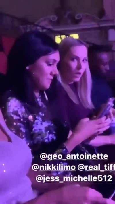 Tiff pushes out her boobs and shakes them