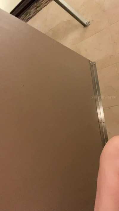 Masturbating in a public bathroom