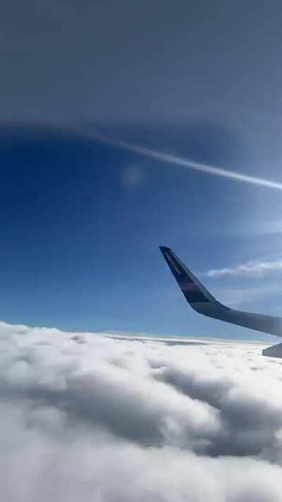 Rising through the cloud layers