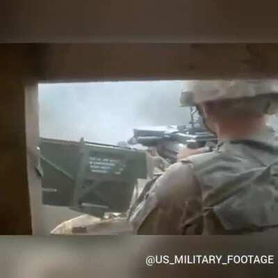 U.S. Army soldiers defend their combat outpost in Afghanistan.