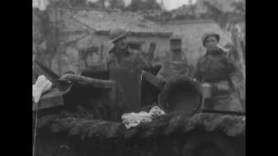 Canadian forces with a Panzer III Ausf. N and Panzer IV knocked out near Ortona in Italy in November 1944