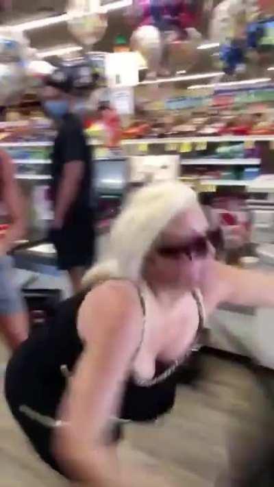 Karen gets dragged out of a store in Long Beach California for not wearing a mask