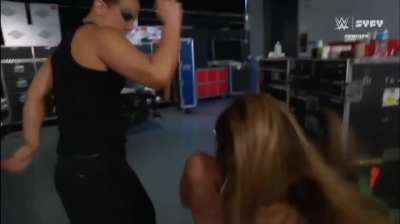 Dakota gets jumped backstage before her match! Poor Dakota.