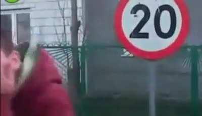 Dude hits an traffic sign