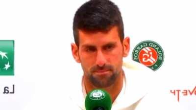 Djokovic asked about being booed at the press conference after the semifinal: *smiles* 