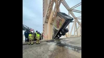 Girl gets extremely lucky after her truck nearly falls off a bridge