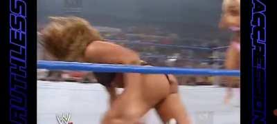 Torrie Wilson gives Nadia a wedgie and spanking