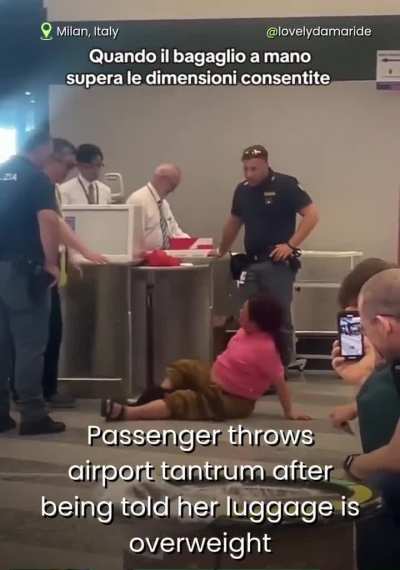 Chinese tourist having meltdown over overweight luggage in Milan