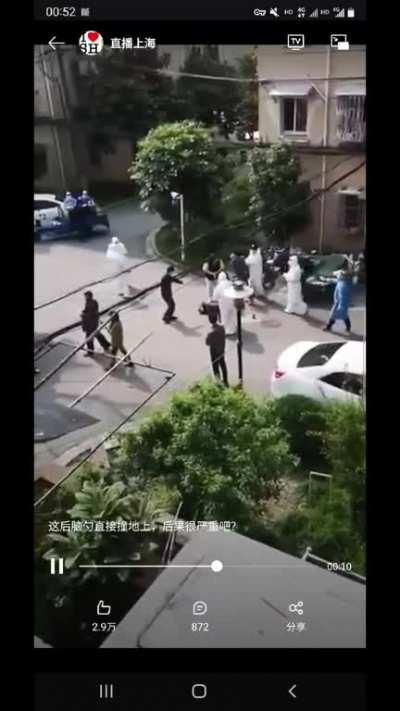 Marshmallow men beat people. The man on the ground is not moving.