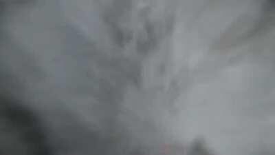 HMRB while I rappel straight through a waterfall. Rio Nero, Italy