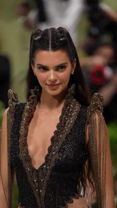 At the Metgala wearing a Givenchy Haute Couture Fall Winter 1999 dress in tulle embroidered with black and brass beads and sequins designed by Alexander McQueen - May 2024