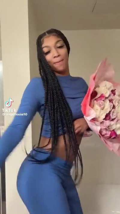 Angel Reese with her flowers