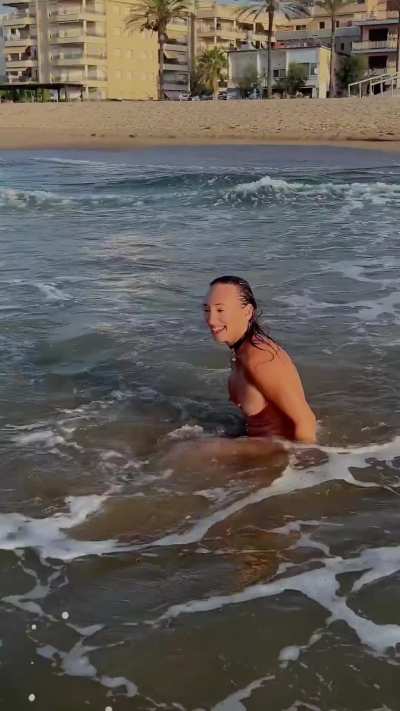 There's something incredibly empowering about wearing nothing but my collar on a public beach