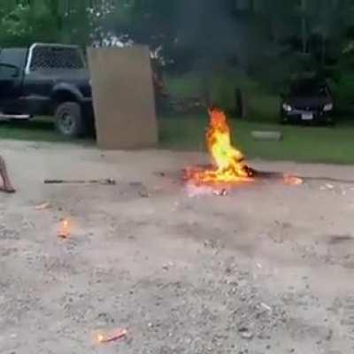 ~ Man uses sledge hammer against cans of spray paint and fire - the results speak for themselves.