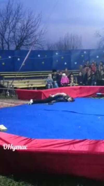 Putting a giant snake around your neck...