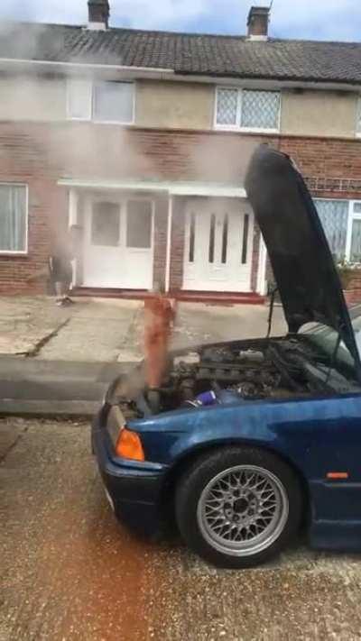 Taking the cap off a hot car radiator