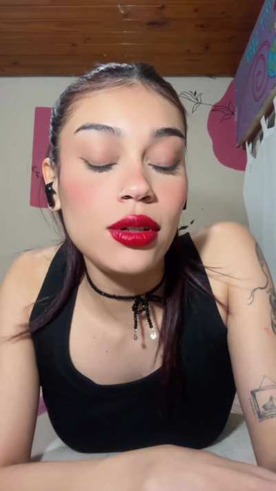 matching my nails with my lipstick and cigarette