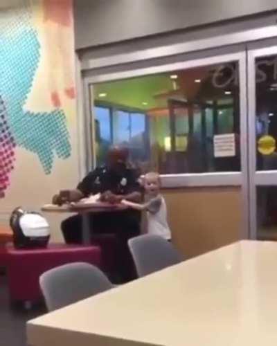 This little boy asked his mom if he could go hug the police officer