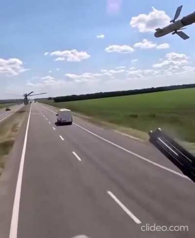 Cockpit footage from a pair of Ukrainian Mi-24 Hind gunships following a motorway to the front at extremely low altitude.