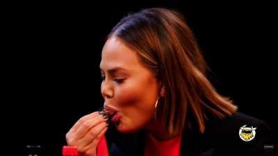Chrissy sucking on it - Hot Ones
