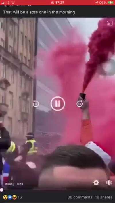 Protestor holding smoke Grenade blows his hand off