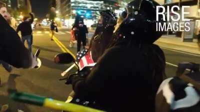 Female protestor pulls a knife and gets knocked out