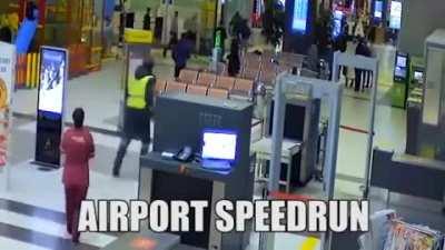 Car drives into airport terminal