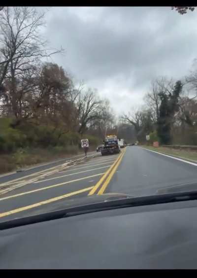 ICE in DC are setting up racially driven checkpoints and roadblocks. This is one on Canal Road. A large number of vehicles can be seen waiting to be towed after these agents disappeared their owners. (11/21/25)