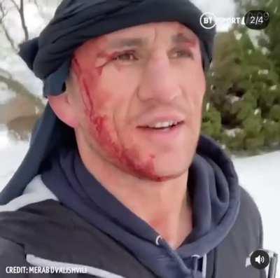 UFC fighter films himself jumping headfirst into a frozen river