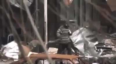 Mentally disabled man sent by IS to buy them some time while trying to flee from their location as the Iraqi federal police keep pushing through the city of Mosul. 2017. ( the man was believed to be strapped to a suicide belt)