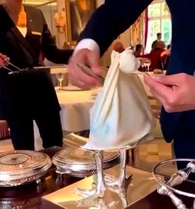 Fancy chicken served at the 3-Michelin star Epicure restaurant in Paris, France.