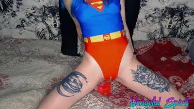 Supergirl cosplay slut masturbates and rides dildo