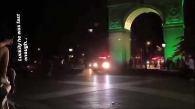 NYPD police car attempts to run over bicyclist in park