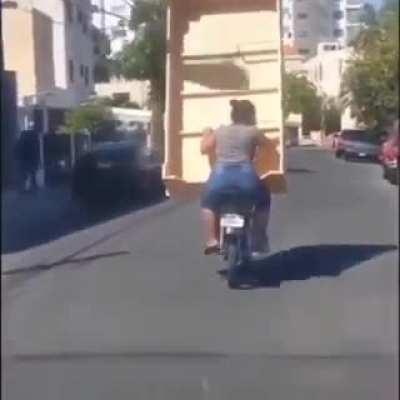 Does transporting a bookcase on a motorcycle count?