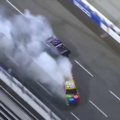 Nascar driver Kevin Harvick attempts to take out driver Kyle Busch but ends up saving it and resulting in Harvick crashing