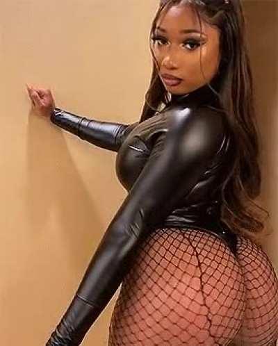 Megan Thee Stallion twerking in leather and fishnets