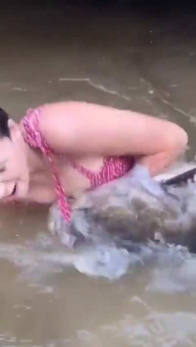 What are the odds it swims off with her?!
