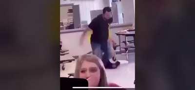 Dude rips kid out of seat and throws pride flag in the trash